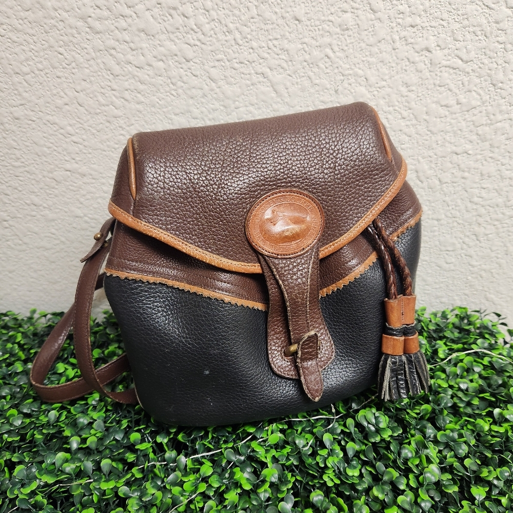 Dooney & Bourke Teton vintage RARE Drawstring saddle tasseled Pebbled crossbody.